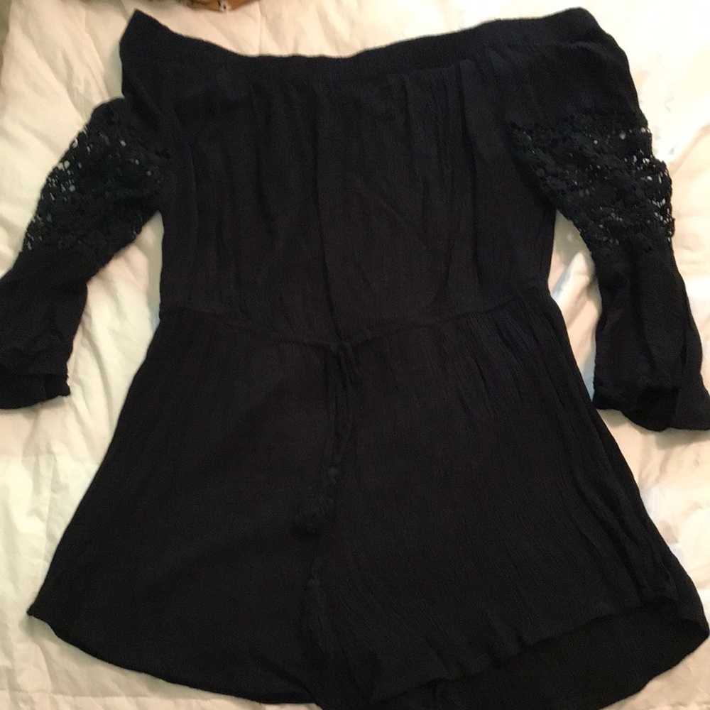 black romper with floral detail sleeves